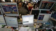 European shares mostly lower, Hong Kong unrest weighs