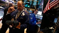 Stocks down after mixed bag of earnings reports