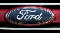 Ford CEO Mulally to stay with company