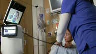 Robots allow doctors to diagnose, advise patients remotely