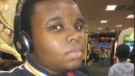 What did the autopsy reveal about Michael Brown’s shooting?