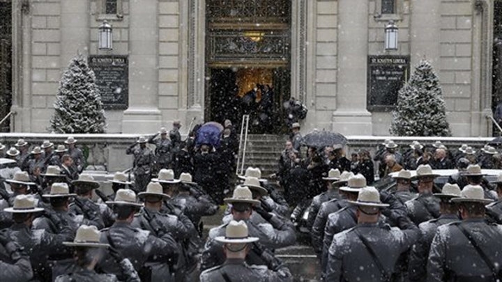 Hundreds gather for the funeral of Mario Cuomo