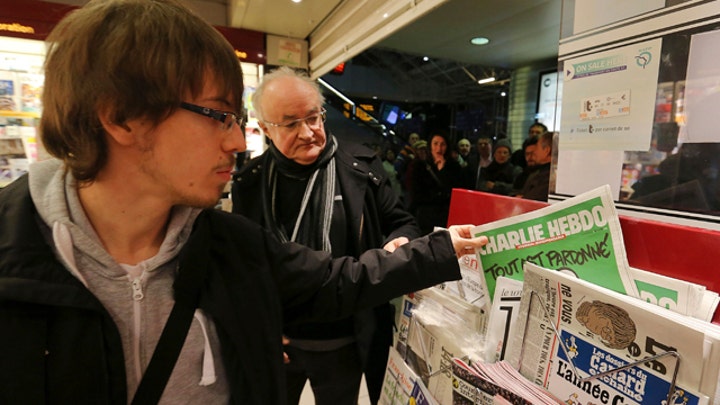 New Charlie Hebdo issue flies off newsstands in France