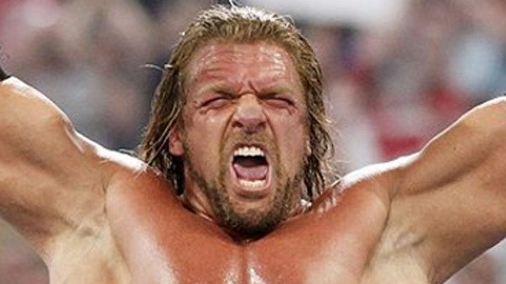 Triple H makes little boy cry