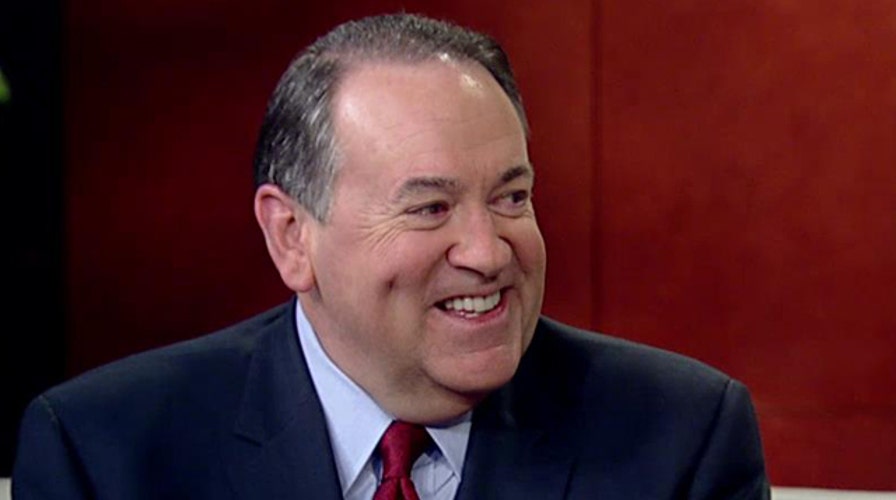 Mike Huckabee reacts to the presidential polls