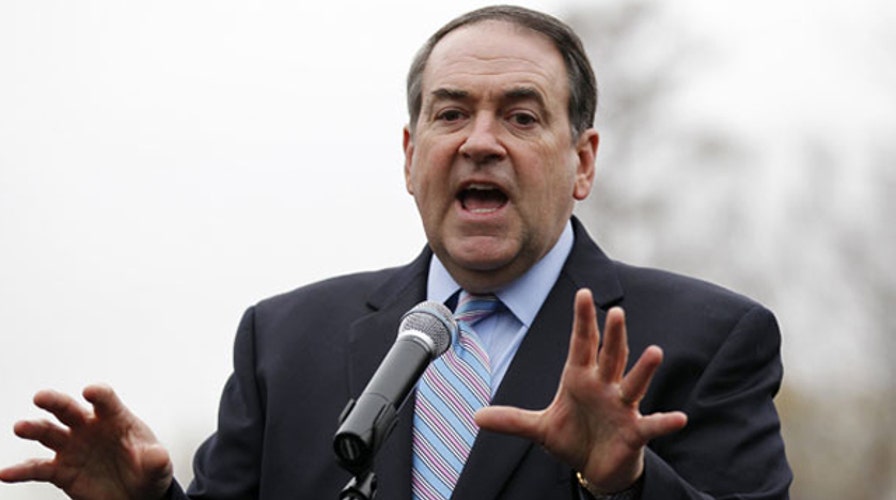 Alan Colmes and Gov. Mike Huckabee 