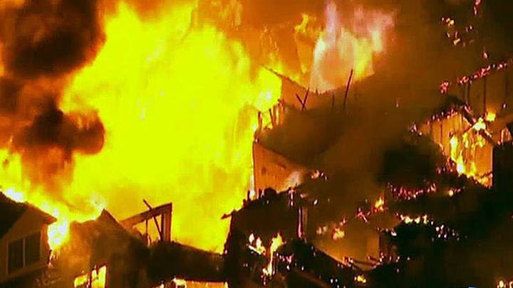 Massive fire destroys luxury apartment complex