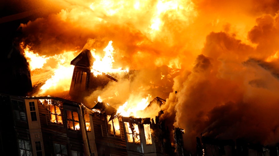 Massive blaze tears through luxury apartment complex