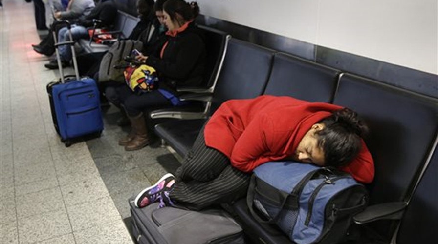 Thousands of travelers stranded in the wake of snowstorm