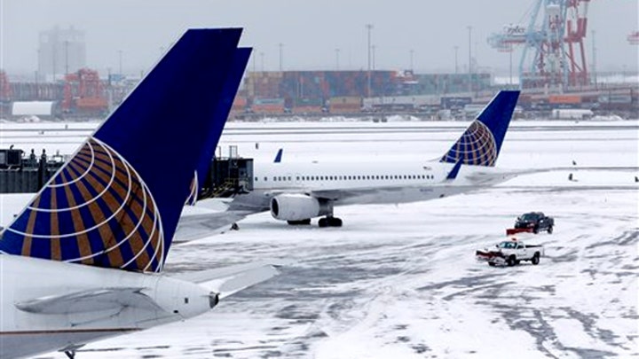 Airlines struggle to resume normal schedules after blizzard