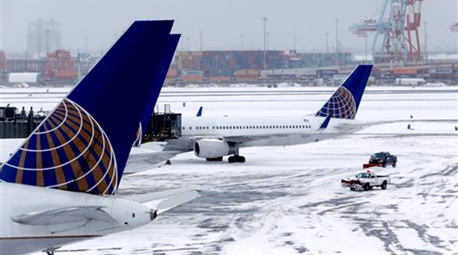 Airlines struggle to resume normal schedules after blizzard