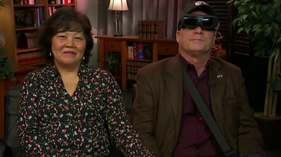 Blinded soldier sees wife first time in 20 years