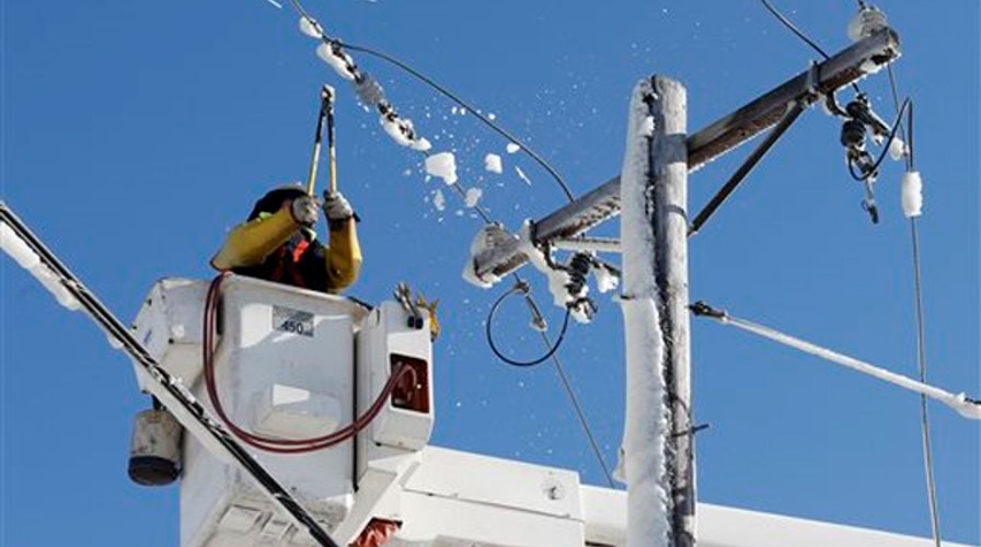 Crews in New England work to restore power after blizzard