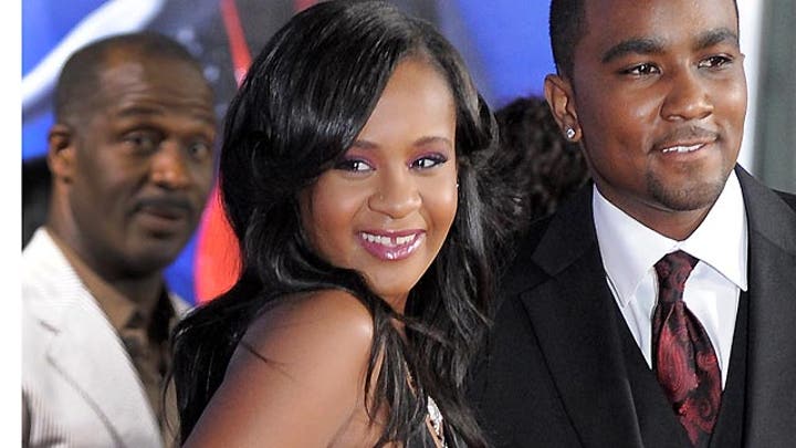 Whitney Houston's daughter reportedly clinging to life