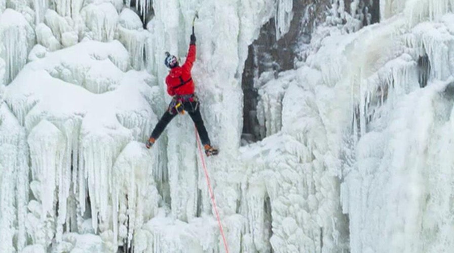 Ice climber becomes first to ascend frozen Niagara Falls