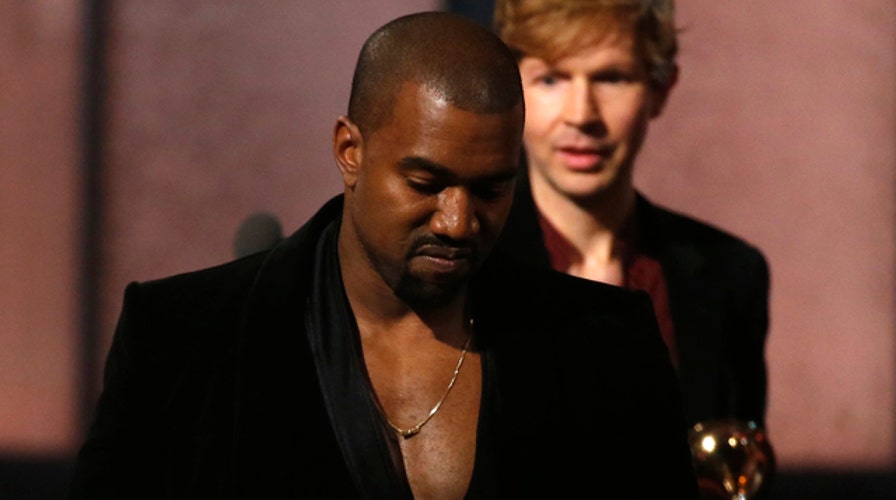 Kanye storms Grammys stage, rants against Beck