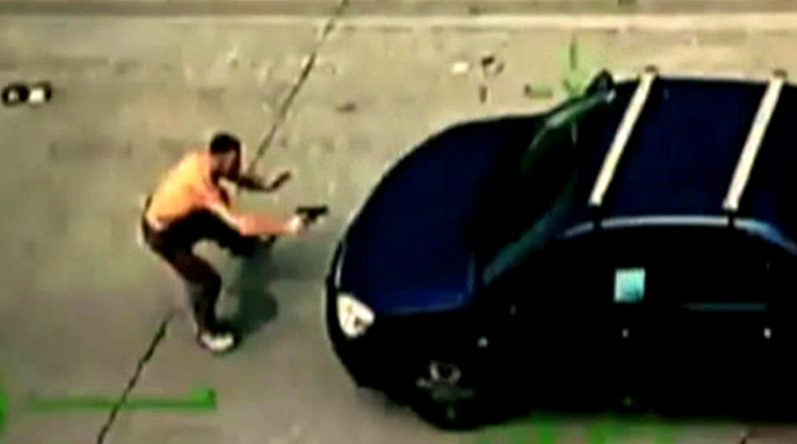 Armed suspect fires at passing vehicles, mowed down by car