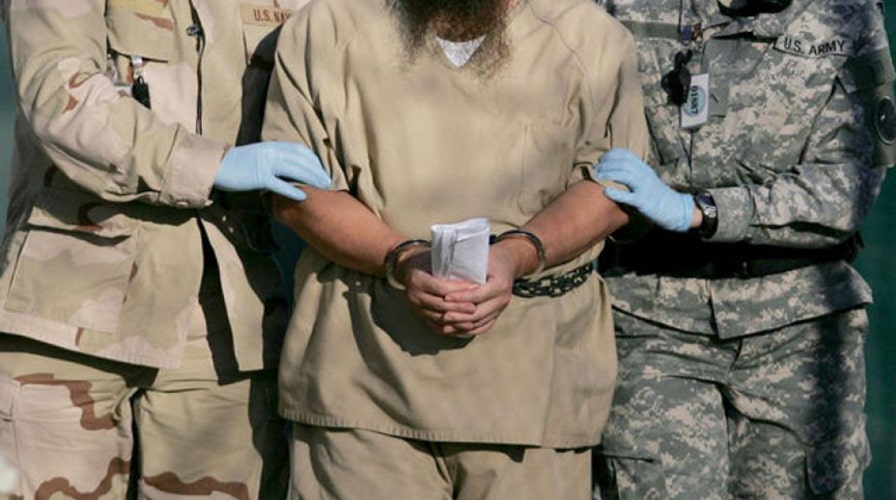 Former intel chief sparks new debate over Gitmo transfers