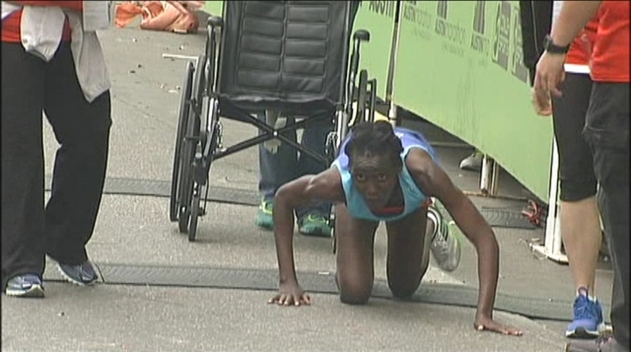 Woman crawls her way to third place in Austin Marathon