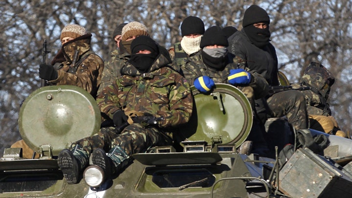 Ukraine troops retreat as rebel continue to attack key city