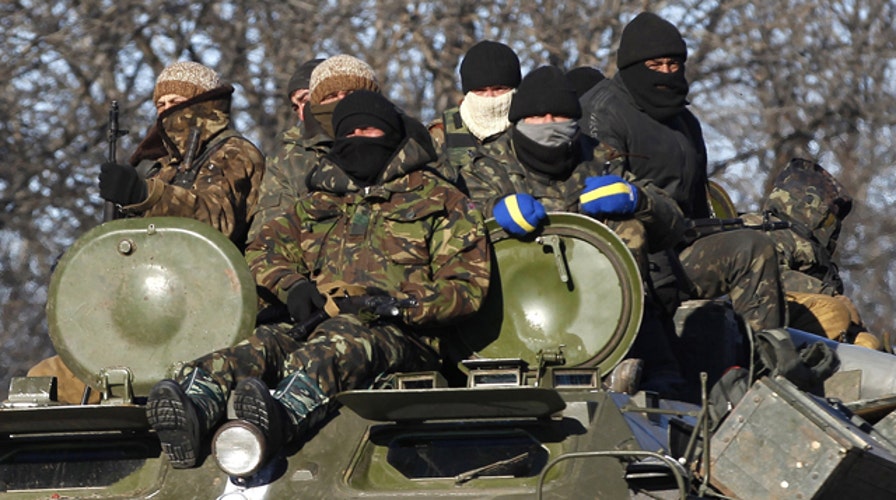 Ukraine troops retreat as rebel continue to attack key city