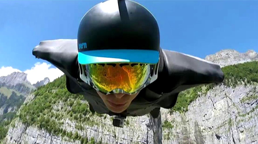 Wingsuit flier soars over Swiss Alps with GoPro camera