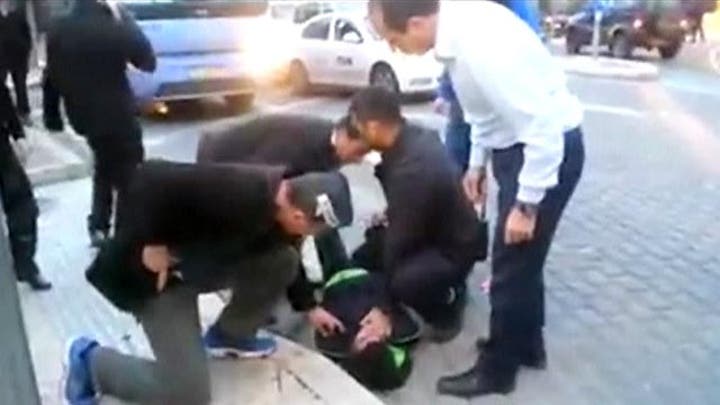Jerusalem mayor wrestles knife-wielding attacker to ground