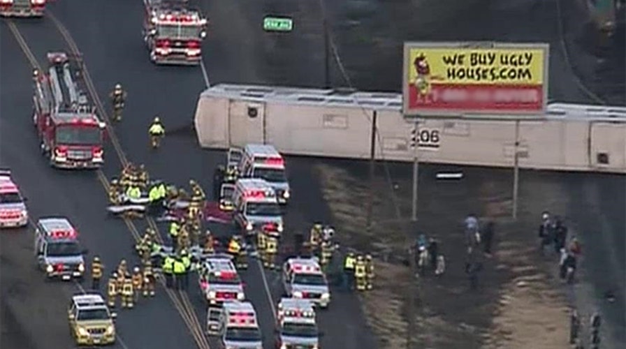 Commuter train in southern California hits truck, derails
