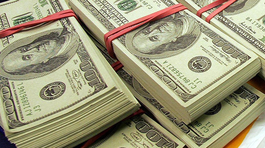 Americans are making more money, but still cutting back