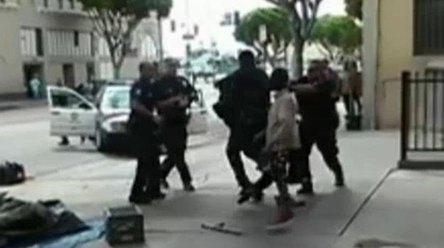 New surveillance footage shows moments before LAPD shooting