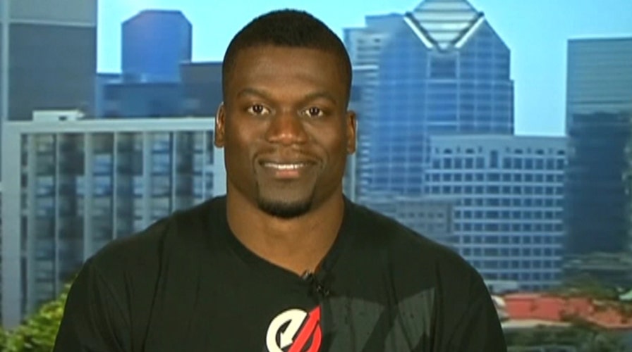 Behind NFL star's Facebook prayer for persecuted Christians