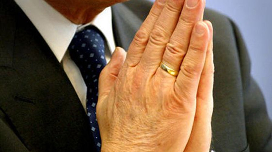 Court says man can't sue for burns he got while praying