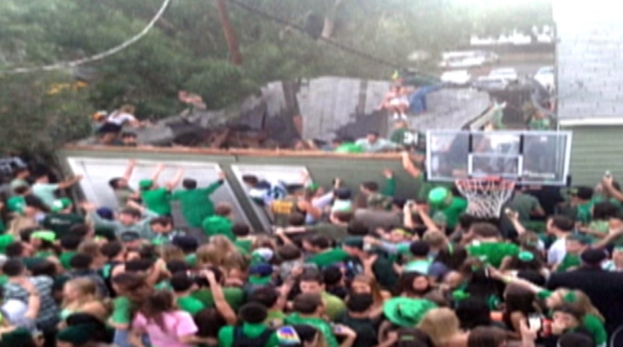 Roof collapses under college kids