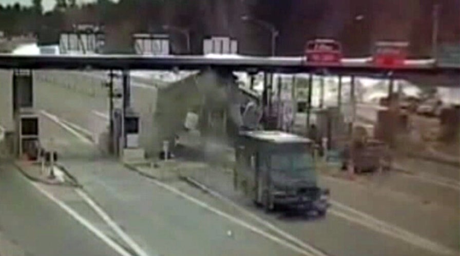 Video shows truck collision with toll booth in New Hampshire