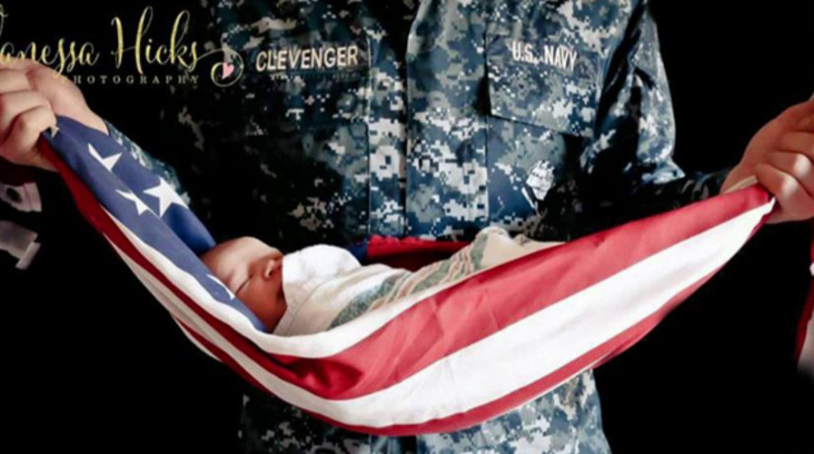 Outrage over Navy family's baby wrapped in American flag
