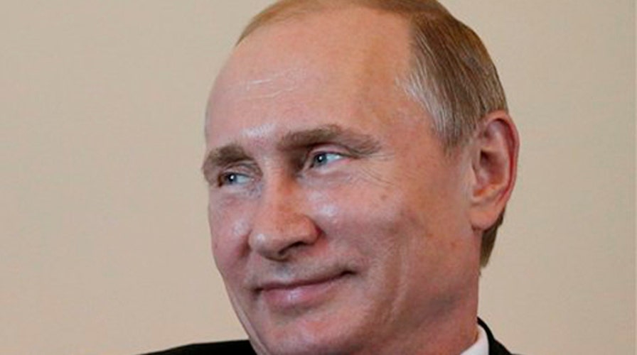 Putin returns to public spotlight amid mystery