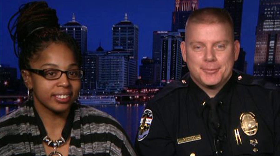 Cop helps runner overcome obstacles, finish race