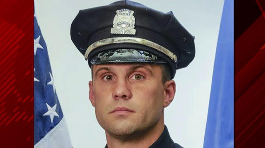 Boston cop shot in head expected to make full recovery