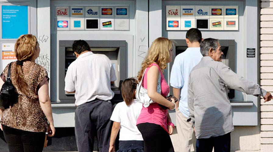 Taking cash out of the ATM may be costing you a little less