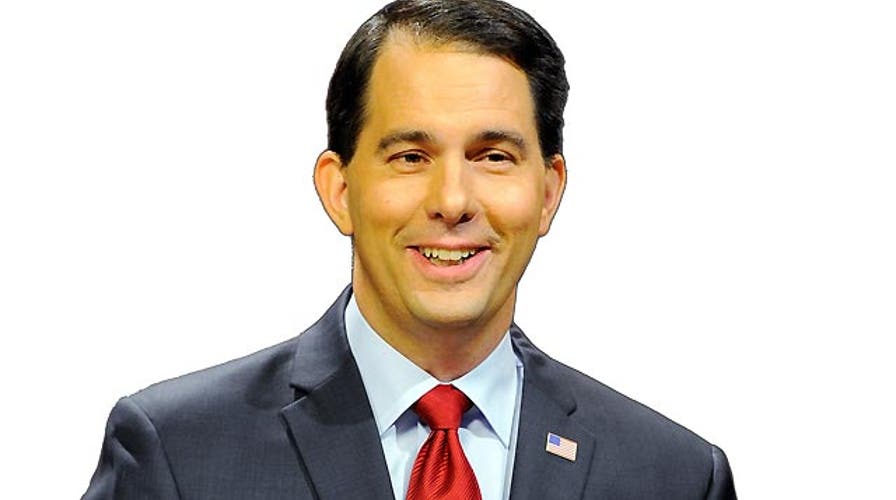 Wisconsin Gov. Scott Walker takes lead in 91���� poll