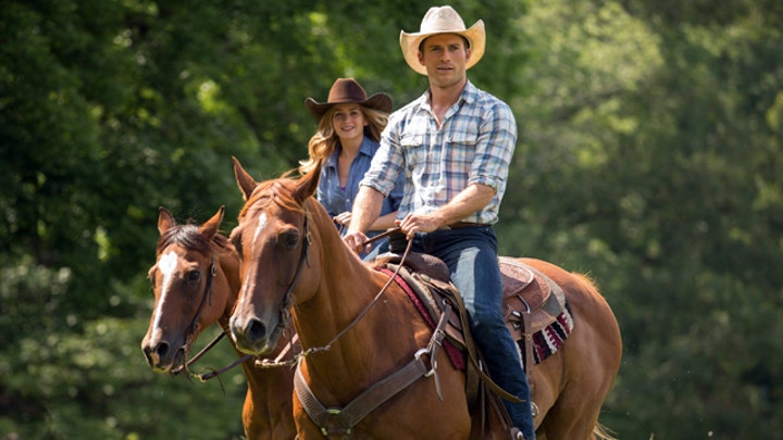 Eastwood and Robertson buckle up for 'The Longest Ride'