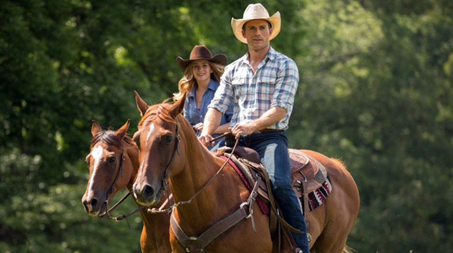 Eastwood and Robertson buckle up for 'The Longest Ride'