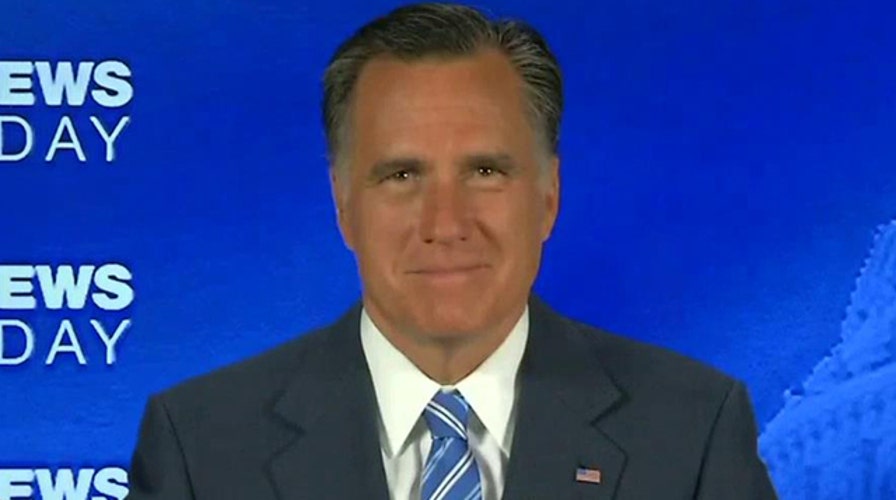 Mitt Romney talks Clinton's candidacy, crowded GOP field