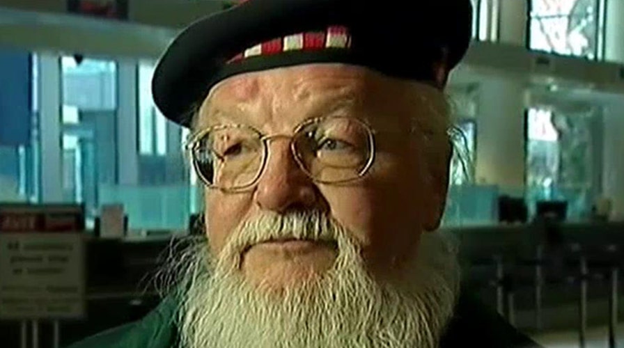 Woman accused of stabbing man with pen on plane 