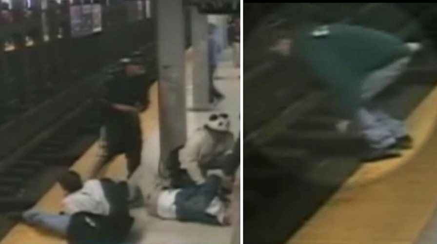 Hero jumps onto tracks to save man who fell off platform