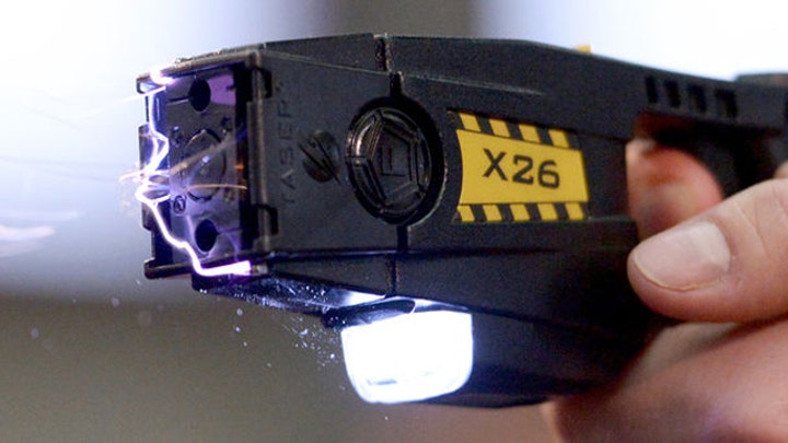 A closer look at the controversial history of the Taser
