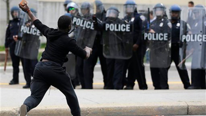 Riots erupt in Baltimore, despite call for calm