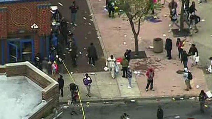 Baltimore police: 7 officers injured, one 'unresponsive'