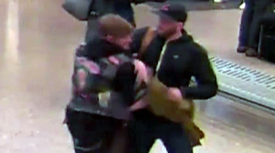 Caught on camera: Man punches passenger after flight