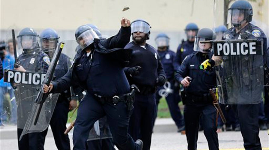 Baltimore protests over Freddie Gray's death turn violent
